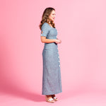 Load image into Gallery viewer, The Ava Dress is slimming thanks to the side button down design and fitted bodice

