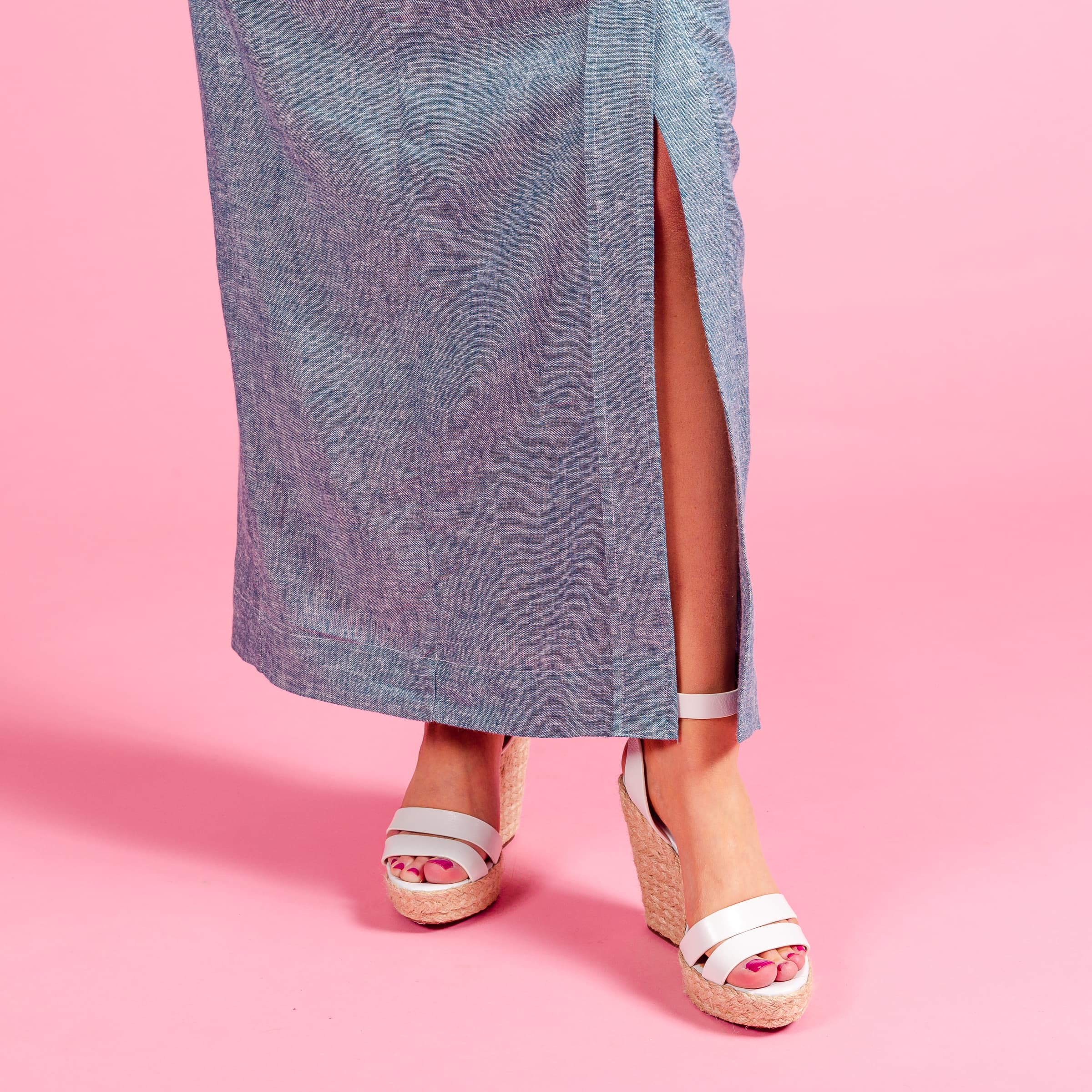 A knee length slit in the Ava Dress allows for comfort and cooling during hot summer days. The natural linen and rayon blend cools while maintaining coverage