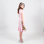 Load image into Gallery viewer, The Paulette is a fun and feminine dress that celebrates ruffles and pink!
